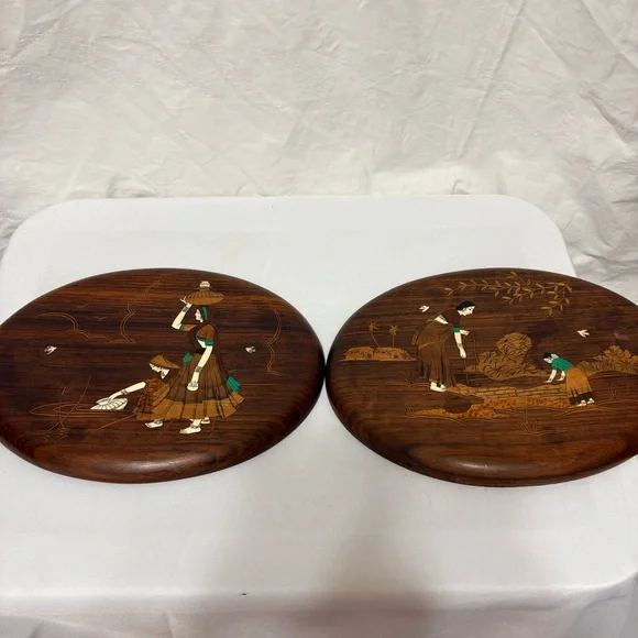 Vintage Indian rosewood wall art plaques with intricate bone inlay designs.